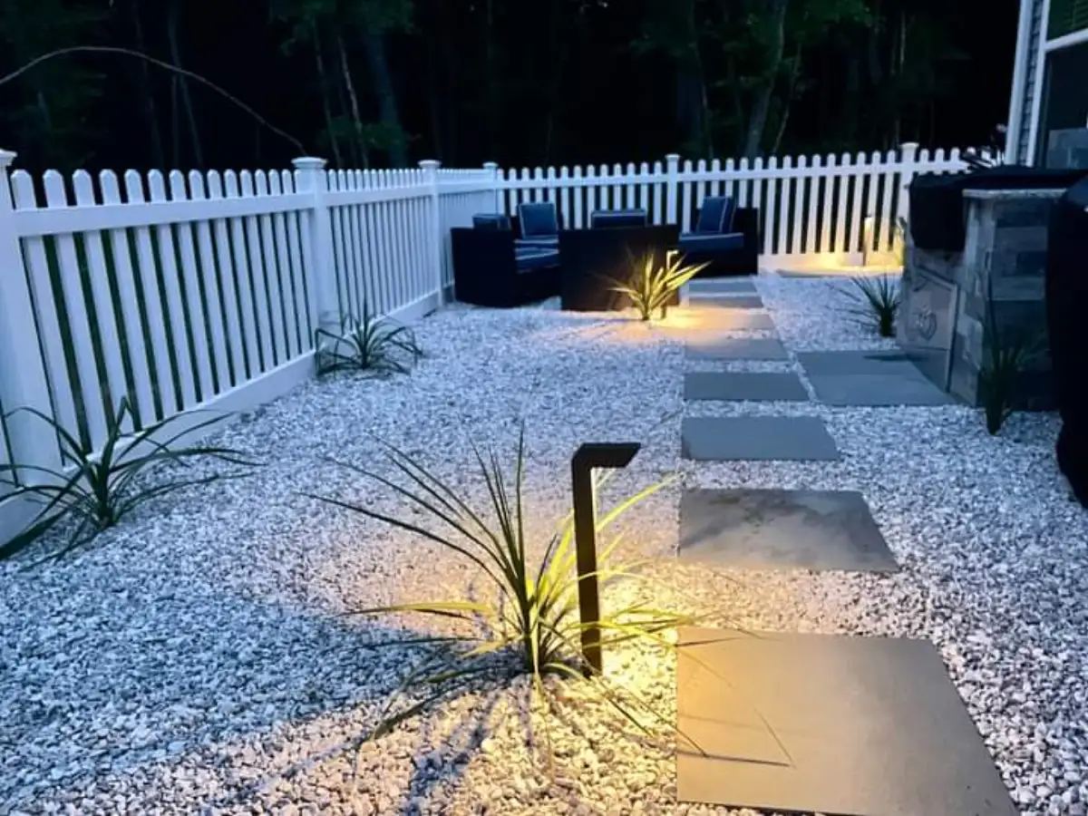 Fire table with glass surround on outdoor patio