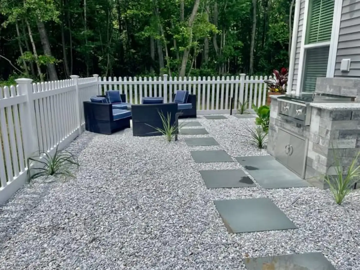 Outdoor kitchen prep area with side burner and storage