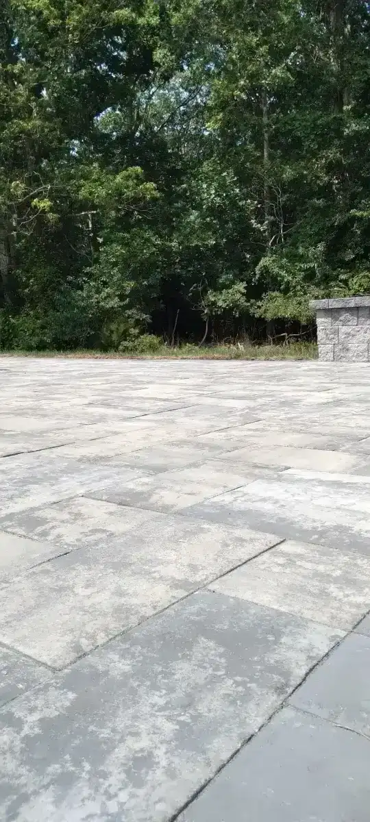 Outdoor kitchen with stone base and built-in grill in Delaware