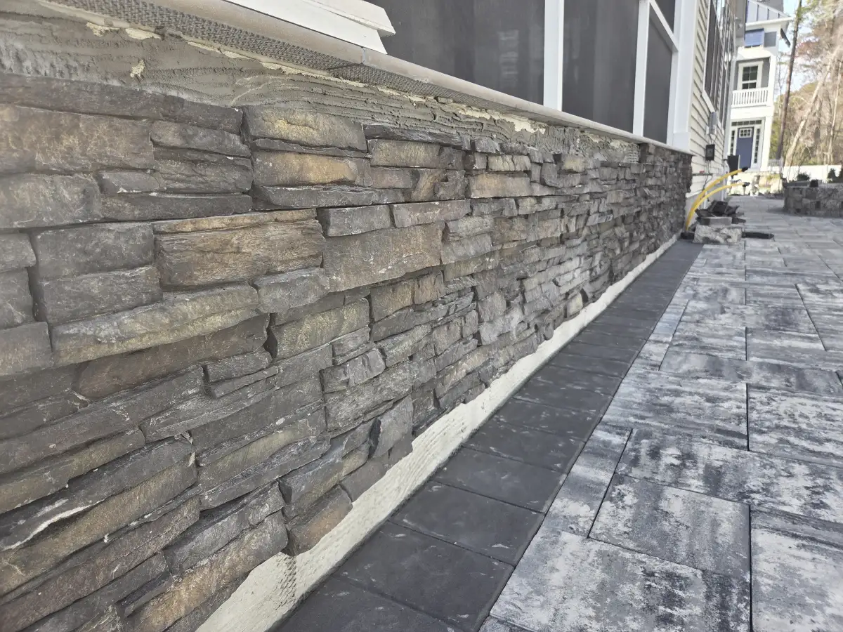 Paver walkway connecting outdoor areas in coastal Delaware