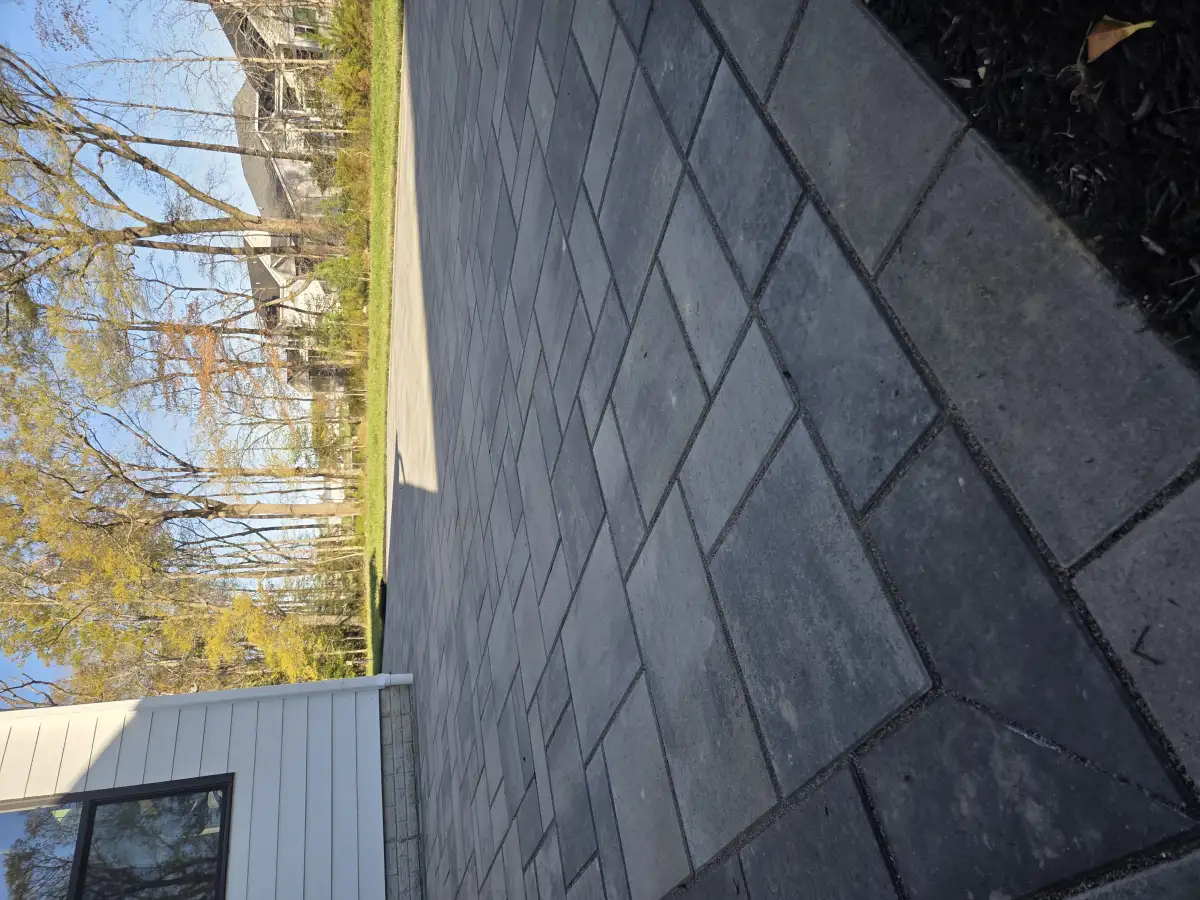 Large paver patio installation with multi-level design