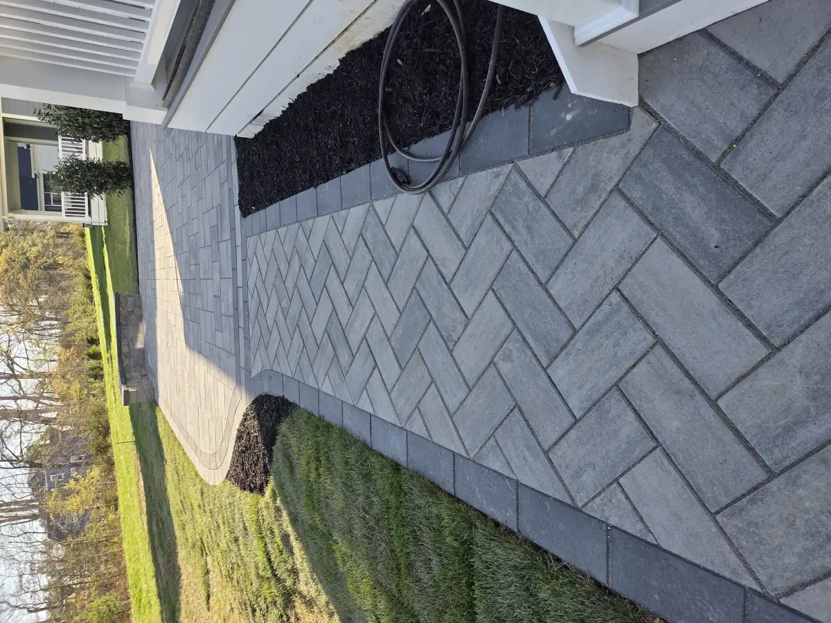 Concrete paver patio with herringbone pattern in Sussex County
