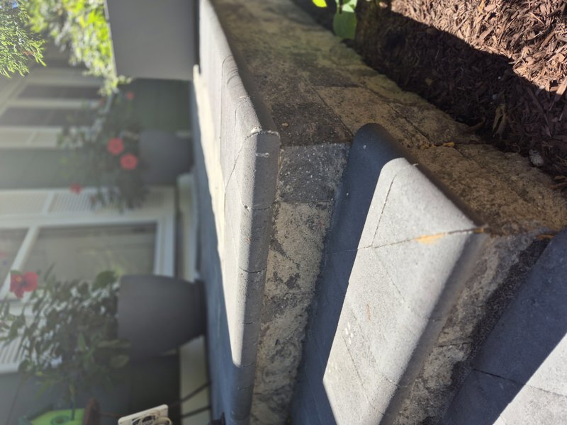 Stone hardscape detail used for utility enclosure access planning